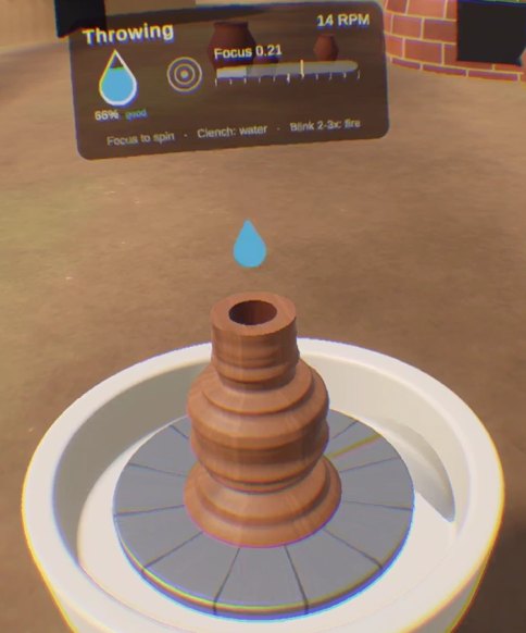 A drop of water falling onto the clay.