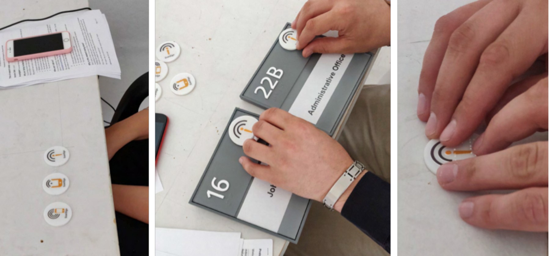 Hands exploring the acrylic tag disks on a table, and fingers finding a tag on a room sign next to its raised number.