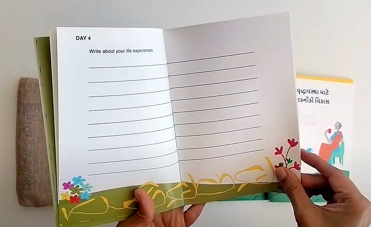 The booklet held open at day 4 · life satisfaction: A letter about your life experiences.
