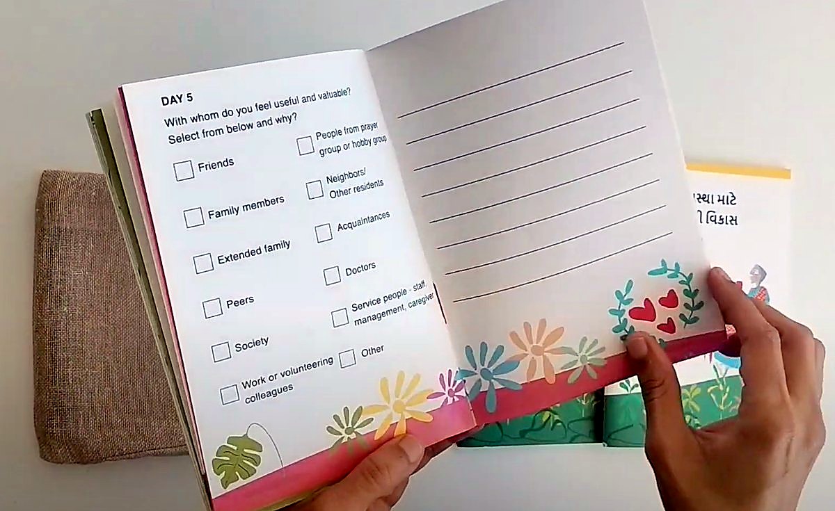 The booklet held open at day 5 · feeling valued: With whom you feel useful and valuable.