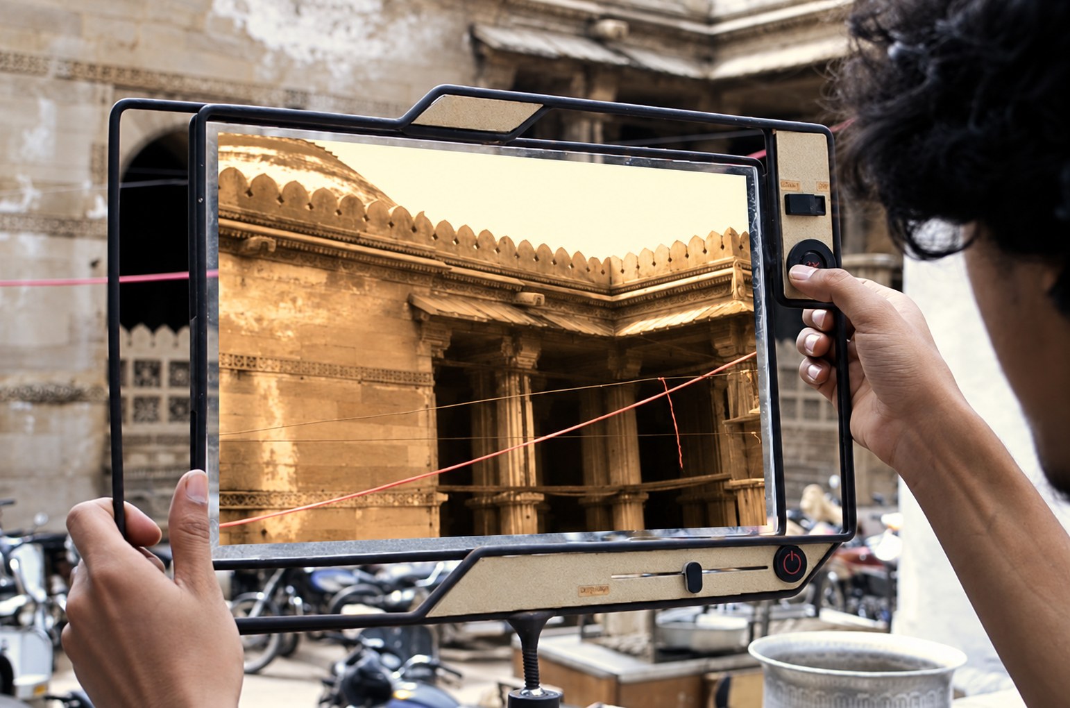 The same courtyard in sepia, a later era on the timeline.