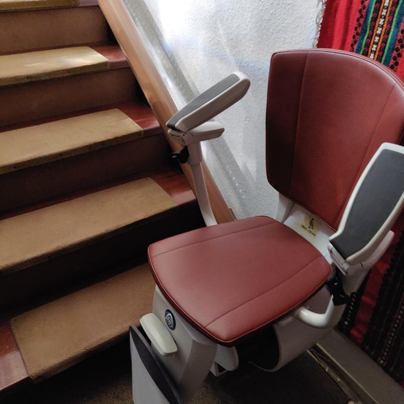 A stairlift on a home staircase.